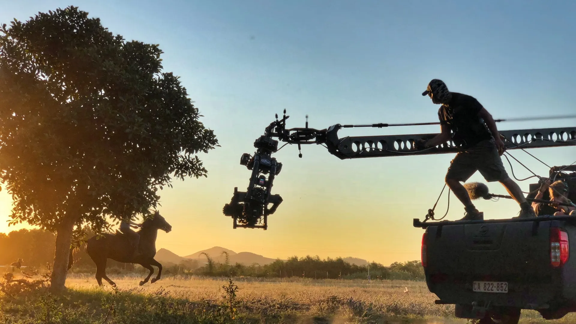 Mackenzie Foy on Beauty with Key Grip Rob Fischer on the tracking vehicle with David Procter - pic Graham Bartholomew