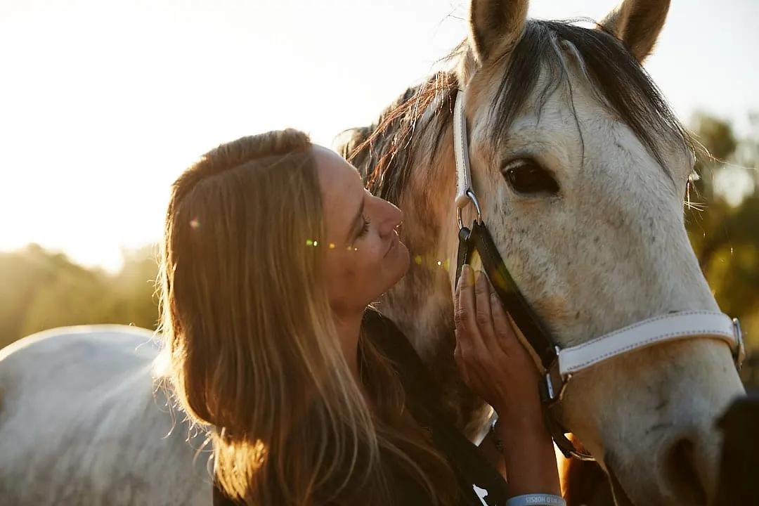 Ashley Avis petting Ghost