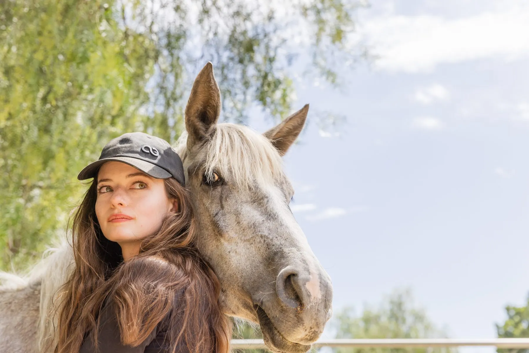 Whisper of the Wild grazing in an open pasture after her rescue.